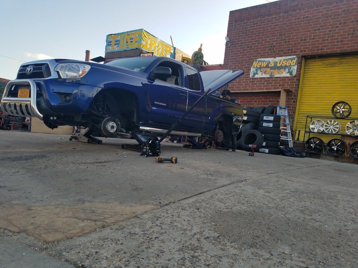 The New K&C Tire Shop Inc. Auto Service work bay